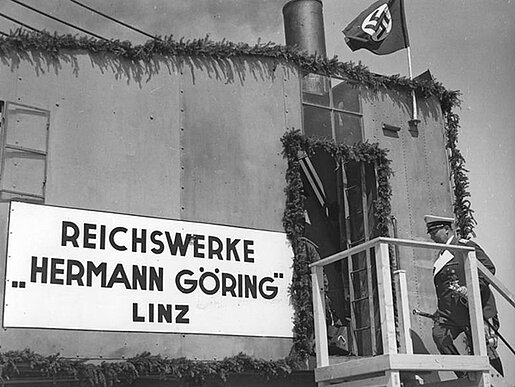<a href="http://commons.wikimedia.org/wiki/File:Bundesarchiv_Bild_183-H06156,_Linz,_Reichswerke_%22Hermann_G%C3%B6ring%22,_Spatenstich.jpg">Reichswerke „Hermann Göring“ in Linz</a> © Bundesarchiv, Bild 183-H06156 / CC-BY-SA